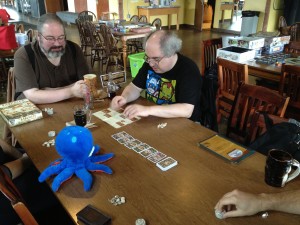 L'ouis l'Octopus helps us organize our shiny stones.